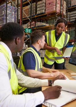 two people in a factory